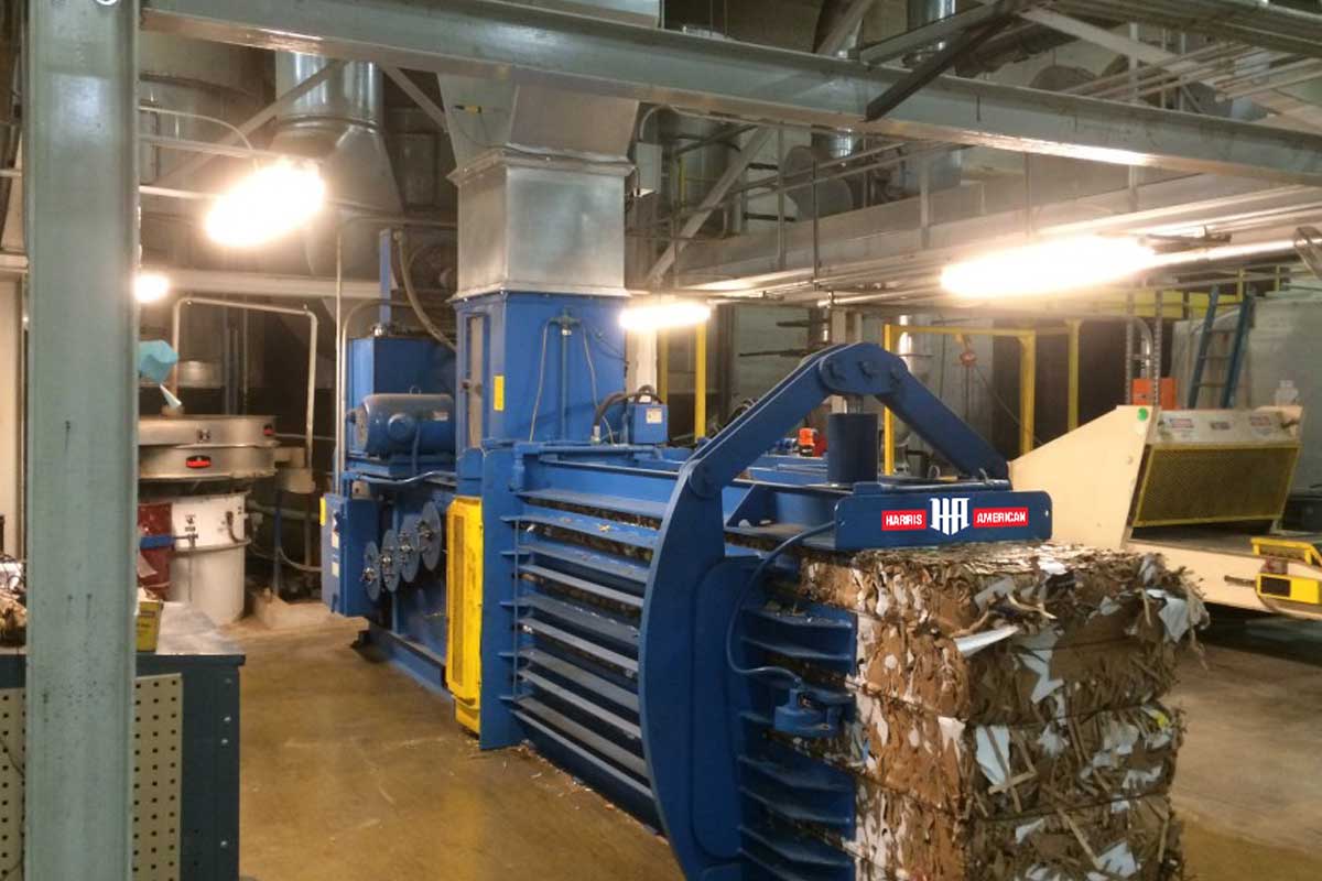 Harris American Co. 29N Series Baler Making Bales Of Cardboard