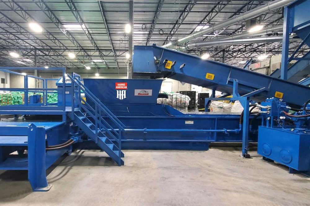 Blue Harris American Co. Badger Baler Inside A Warehouse
