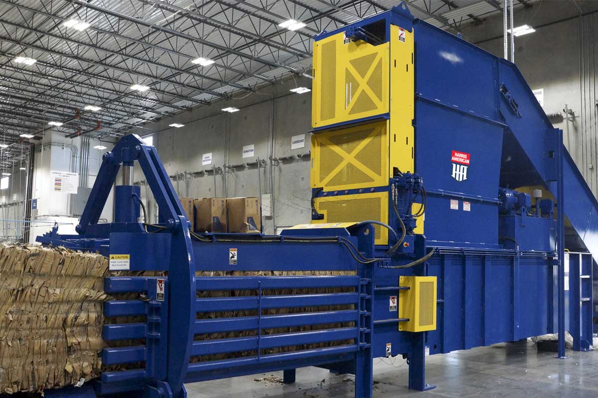 Harris American Co. Blue And Yellow Cardboard Baler
